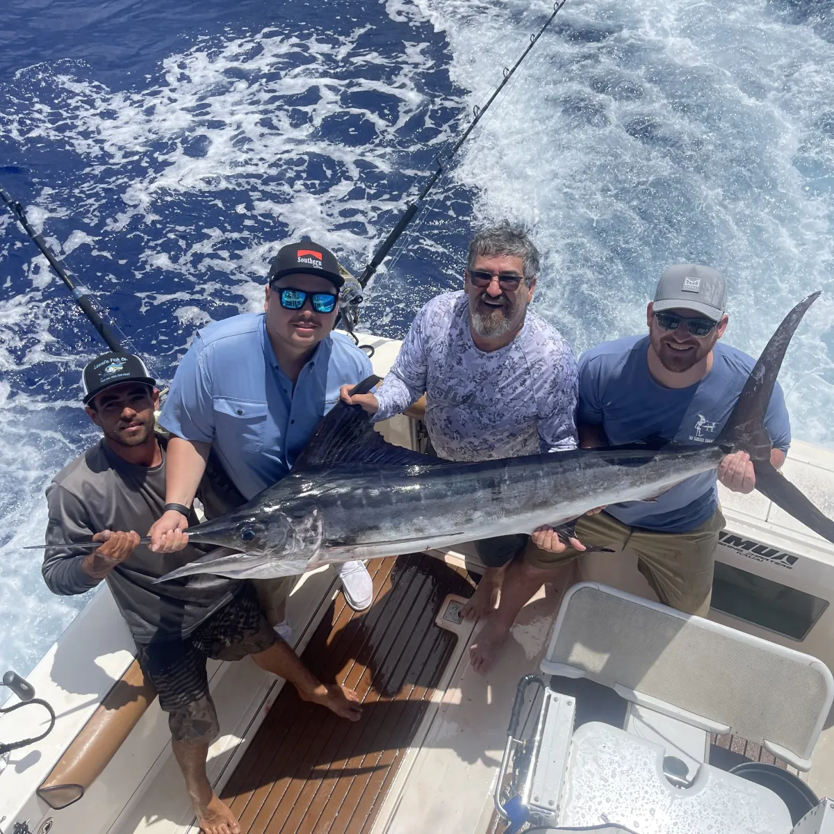 a man holding a fish